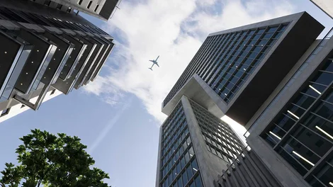 Vista desde la calle al cielo viendo laterales de edificios