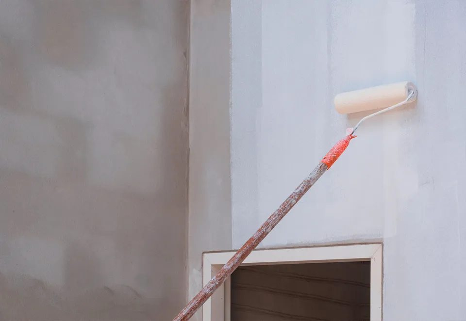 aplicando en pared tectorpaint fijadores Holcim