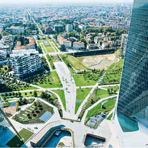 Urbanismo sostenible con rascacielos modernos, amplias zonas verdes y espacios peatonales integrados en un entorno urbano de alta densidad y arquitectura contemporánea.